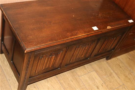 An oak linenfold coffer, W.105cm